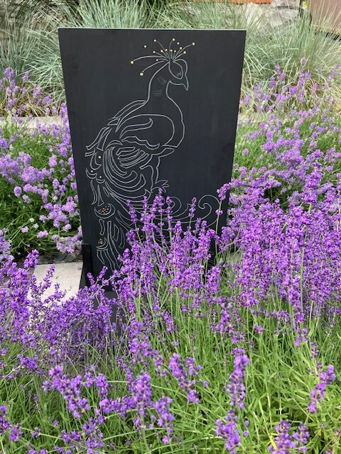 Peacock in Lavender - hand carved slate peacock with gold leafed 'eyes'.